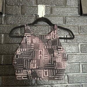 Lululemon power pivot everlux tank top size 12 black Lulu logo color